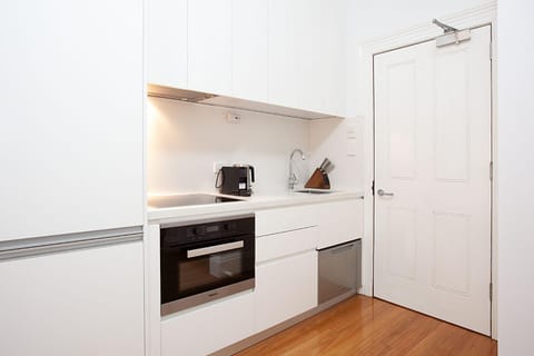 Kitchen or kitchenette, oven, stove