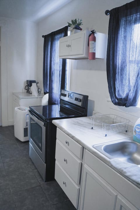 Kitchen or kitchenette, stove