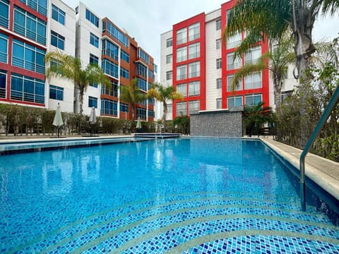 Property building, Day, Pool view, sunbed