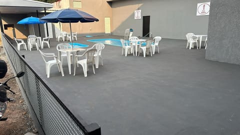 Patio, BBQ facilities, Bathroom, Pool view, Swimming pool, Swimming pool, Drinks, Alcoholic drinks, Non alcoholic drinks, sunbed