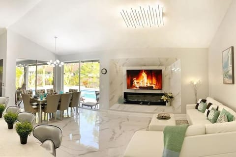 Living room, Seating area, Pool view