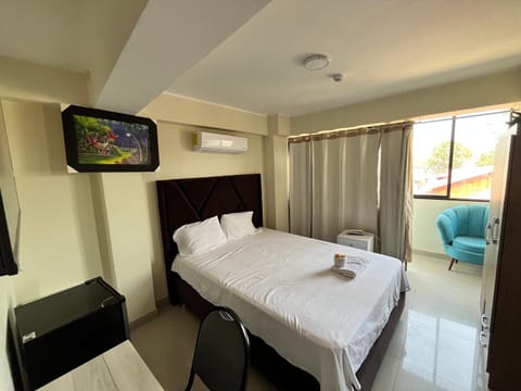 Bed, TV and multimedia, Bedroom, towels, air conditioner