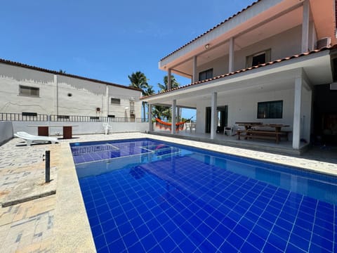 Property building, Patio, Day, Pool view, Swimming pool, sunbed