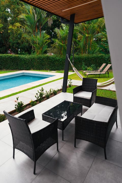 Patio, Garden, Living room, Seating area, Garden view, Pool view, Swimming pool