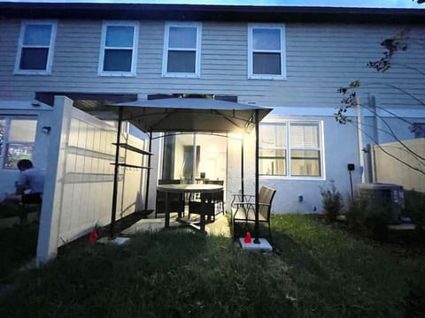 Property building, Patio, Dining area, Garden view