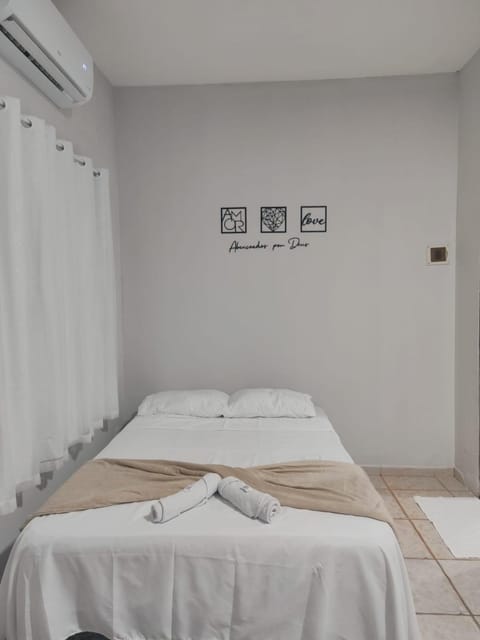 Bed, Photo of the whole room, Bedroom, towels, air conditioner