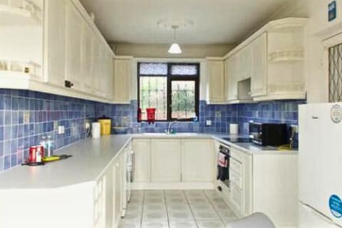 Kitchen or kitchenette, microwave, oven, stove, stove, kitchen