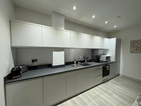 Kitchen or kitchenette, oven