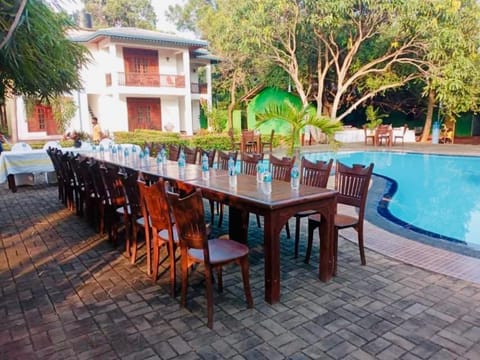 View (from property/room), Dining area, Garden view, Pool view, Swimming pool