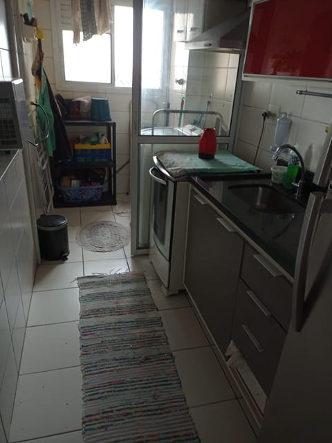 Kitchen or kitchenette, laundry, washing machine