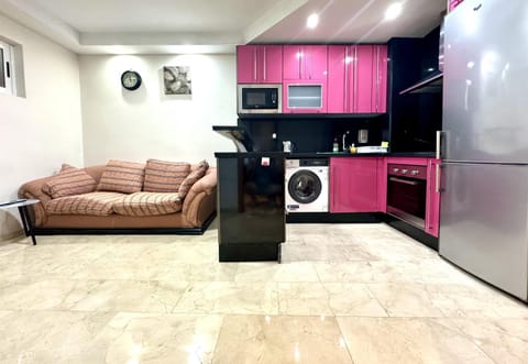 Kitchen or kitchenette, Seating area, oven, washing machine