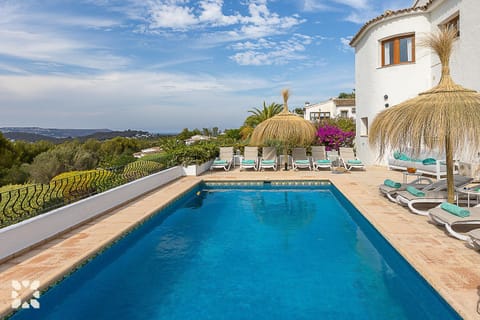 Property building, Patio, Day, Natural landscape, Mountain view, Pool view, Swimming pool, sunbed