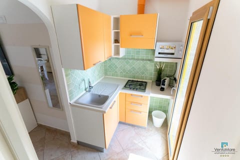 Kitchen or kitchenette, stove, kitchen