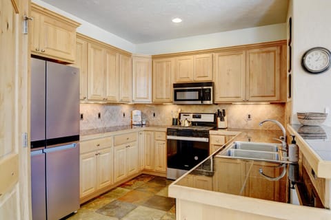 Kitchen or kitchenette, dishwasher, oven, stove, toaster