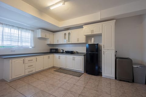 Kitchen or kitchenette, flat iron, microwave, pet friendly, stove, washing machine