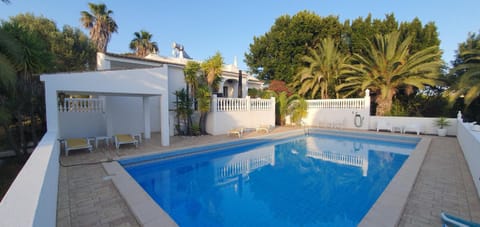 Property building, Pool view, Swimming pool, sunbed