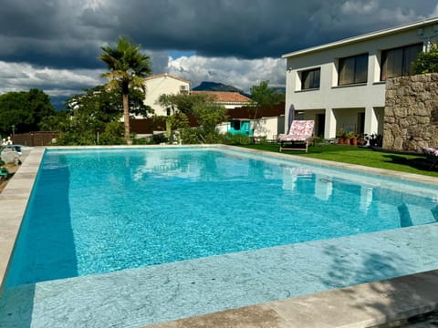 Swimming pool, sunbed