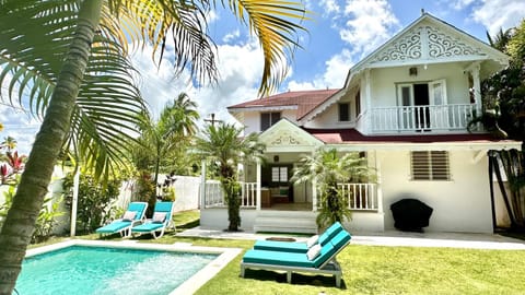 Property building, Patio, Seating area, Garden view, Pool view, Swimming pool, sunbed