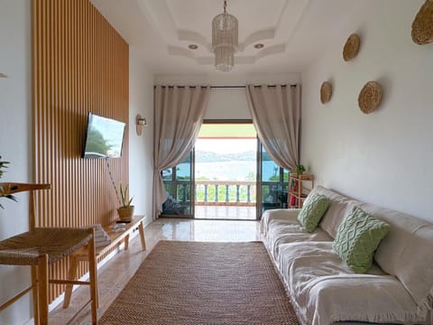 View (from property/room), Living room, Photo of the whole room, Seating area, Sea view