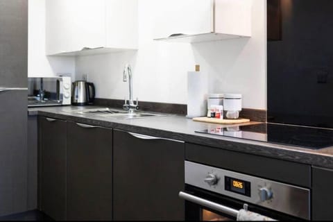 Kitchen or kitchenette, oven, stove