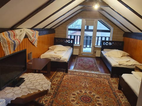 Pensiunea CAPRA CU TREI IEZI Bed and Breakfast in Bran