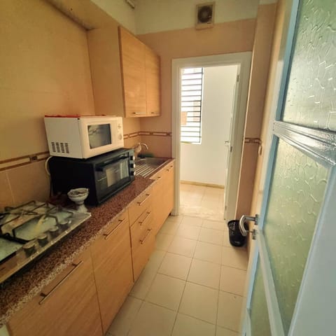 Kitchen or kitchenette, oven, stove