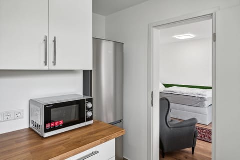 Kitchen or kitchenette, microwave