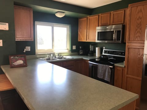 Kitchen or kitchenette, Dining area, dishwasher, oven, pet friendly, stove, toaster