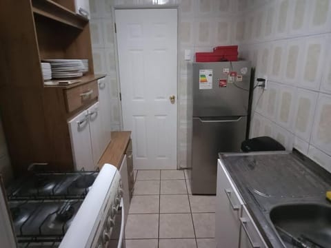 Kitchen or kitchenette, oven, stove