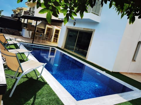 Patio, Day, Pool view, Swimming pool, sunbed