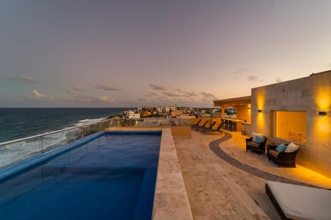 View (from property/room), Balcony/Terrace, Pool view, Sea view, Swimming pool, Sunset, sunbed