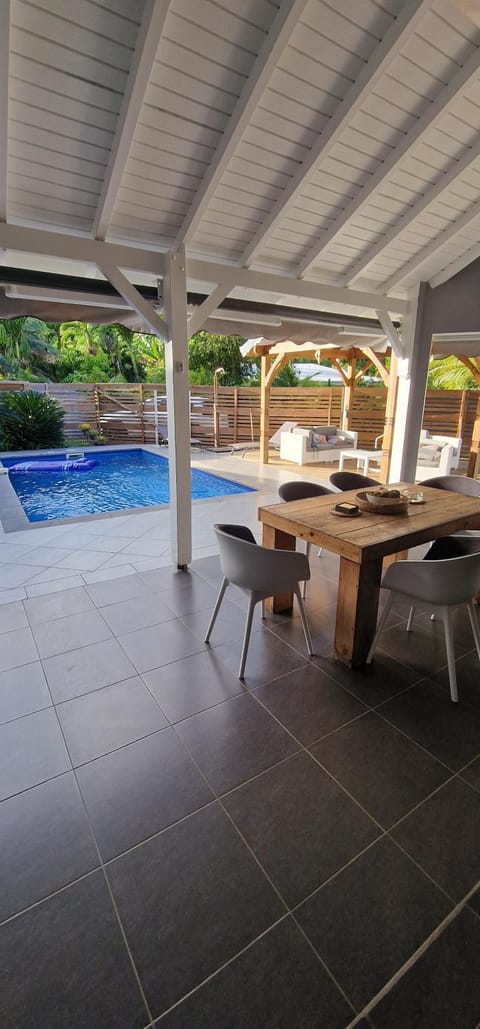 Patio, Day, Dining area, Pool view, Swimming pool