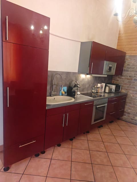 Kitchen or kitchenette, dishwasher, oven, stove, toaster