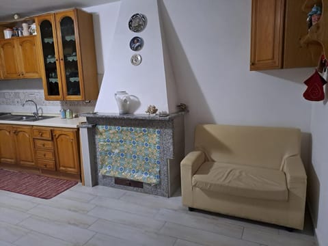 Kitchen or kitchenette, Living room, Seating area, stove