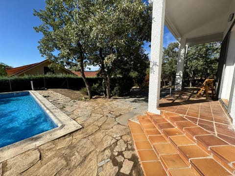 Property building, Patio, Day, Pool view, Swimming pool