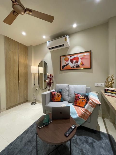 TV and multimedia, Living room, Seating area, wardrobe, air conditioner