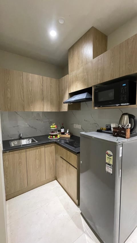 Kitchen or kitchenette, oven, stove