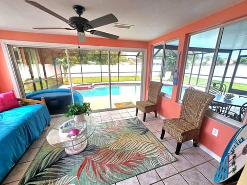 Living room, Seating area, Pool view