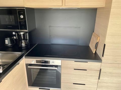 Kitchen or kitchenette, stove