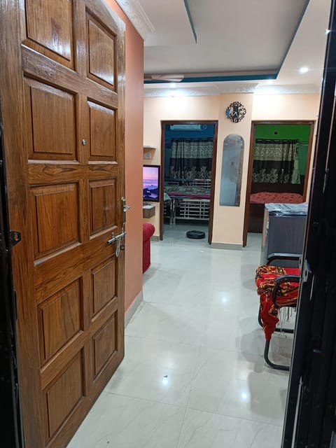 Swarna Biroti 20 mins Airport,100Mbps,SmartTV Apartment in Kolkata