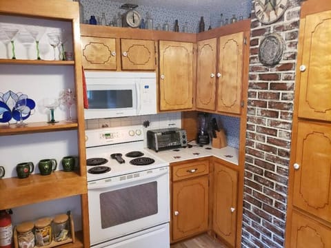 Kitchen or kitchenette, oven, stove, toaster