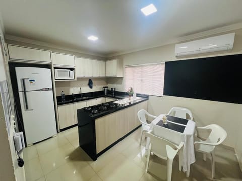 Kitchen or kitchenette, Dining area, microwave, oven, pet friendly, stove, air conditioner