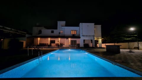 Property building, Night, Swimming pool