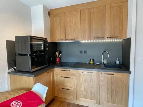 Kitchen or kitchenette, oven, stove