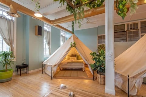 Experience Stay at the Glamping Loft Lake Geneva - Group Stays - 12 Stylish Tent Suites - Kitchen & Bar Luxury tent in Lake Geneva