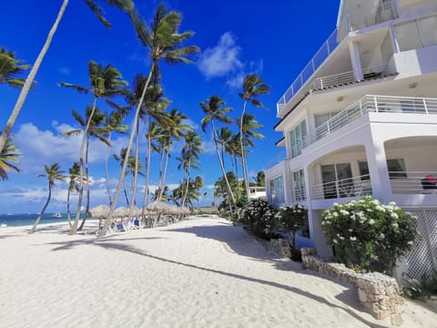 Property building, Day, Natural landscape, Beach, Sea view