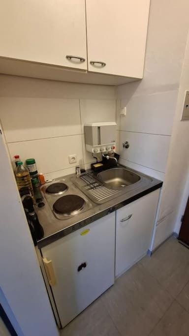 Kitchen or kitchenette, stove