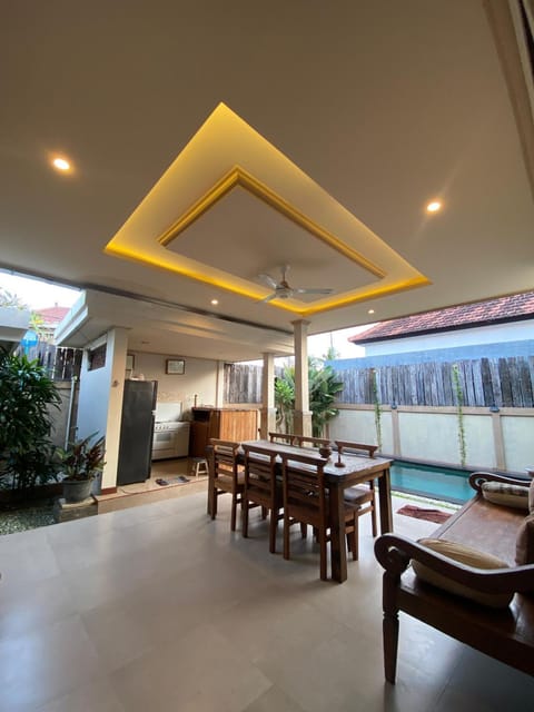 Living room, Seating area, Dining area, Pool view