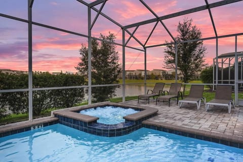 Lakefront 9BR Resort Pool Home Near Disney World House in Four Corners