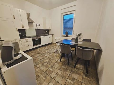 Kitchen or kitchenette, Dining area, dishwasher, stove